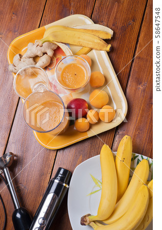 fresh fruit smoothie with banana and apricots at fresh fruit smoothie with banana and apricots at 58647548
