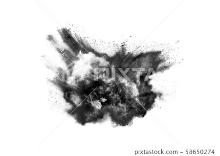 Closeup of black dust particles explode isolated on white background. Closeup of black dust particles explode isolated on white background. 58650274