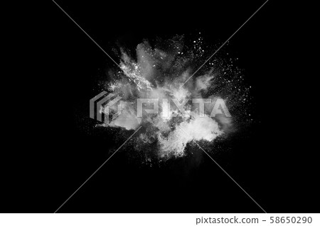 White powder explosion on black background.  58650290