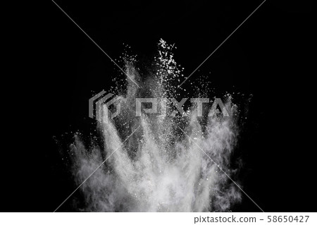 White powder explosion on black background.  58650427