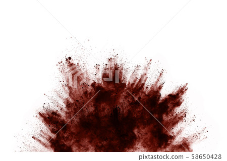 Brown color powder explosion on white background. 58650428