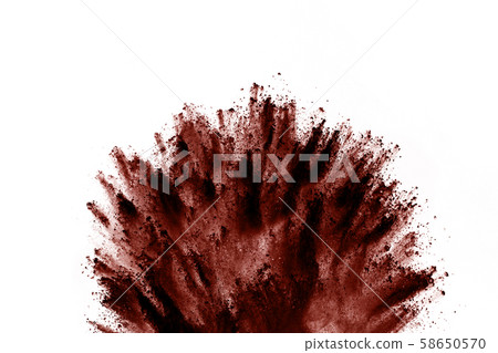 Brown color powder explosion on white background. Brown color powder explosion on white background. 58650570
