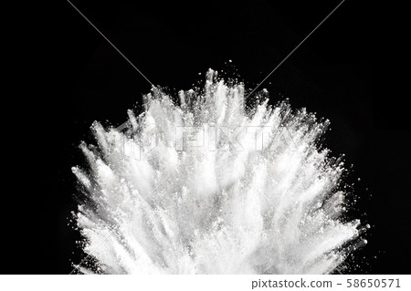 White powder explosion on black background.  58650571