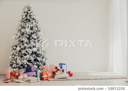 Christmas card Christmas tree with holiday holiday gifts 2020 58653208
