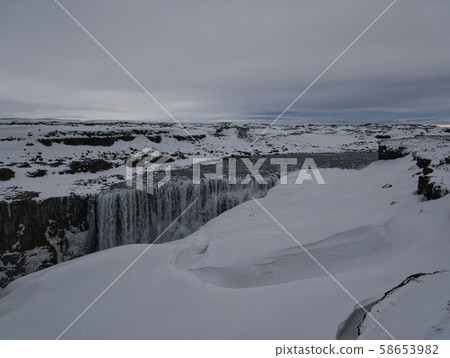Snow-covered landscape at the Dettifoss Waterfall Snow-covered landscape at the Dettifoss Waterfall 58653982