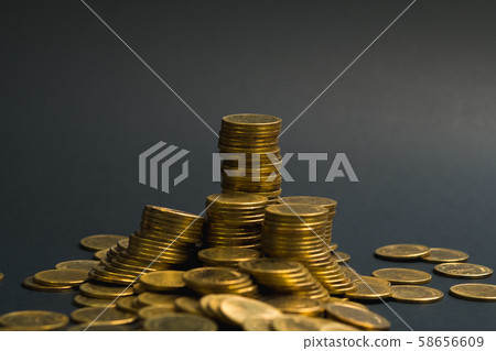 Savings, increasing columns of coins, piles of 58656609