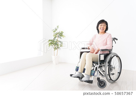 Grandmother in wheelchair Grandmother in wheelchair 58657367