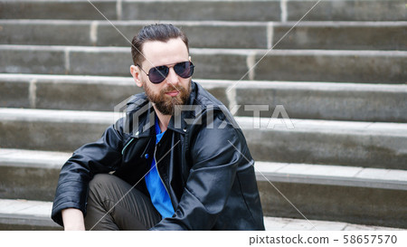 Stylish man on observation deck Stylish man on observation deck 58657570