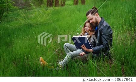 Dad and daughter spend time together in park 58657941