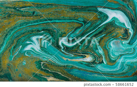 Green and gold glitter ripple pattern. Beautiful liquid texture. Green and gold glitter ripple pattern. Beautiful liquid texture. 58661652