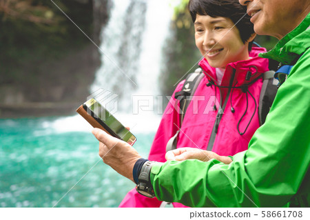 Trekking senior mountaineering waterfall 58661708