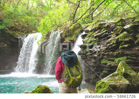 Trekking senior mountaineering waterfall Trekking senior mountaineering waterfall 58661726