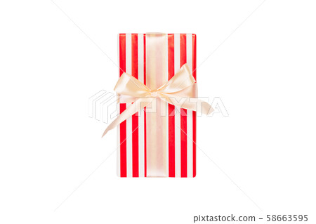 Christmas or other holiday handmade present in red Christmas or other holiday handmade present in red 58663595