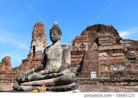Thailand, Ayutthaya World Heritage, Wat Mahathat (Buddha statue and collapsed pagoda) Thailand, Ayutthaya World Heritage, Wat Mahathat (Buddha statue and collapsed pagoda) 58665123
