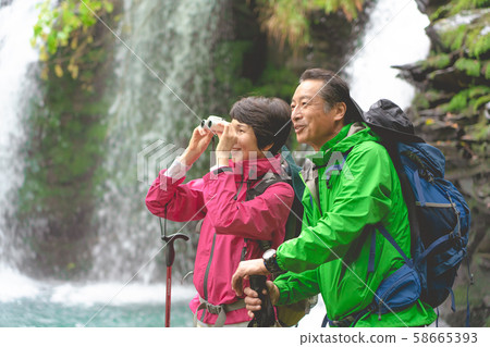 Trekking senior mountaineering waterfall Trekking senior mountaineering waterfall 58665393