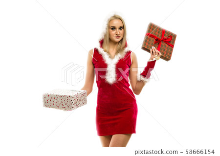 A beautiful sexy girl in a New Year's dress, hold 58666154