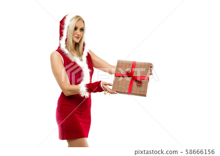 A beautiful sexy girl in a New Year's dress, hold 58666156