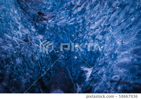 Ice wall of the ice cave (Iceland / Vatnajoklut glacier) Ice wall of the ice cave (Iceland / Vatnajoklut glacier) 58667836