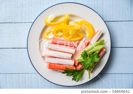 Crab sticks with sweet bell peppers and fresh 58669642
