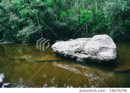 Mountain river stream flowing from waterfall - 58670246
