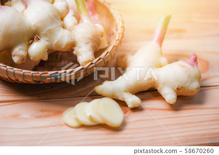 Ginger root harvest on the basket - Fresh young 58670260