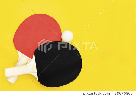 two ping pong table tennis rackets  58670863