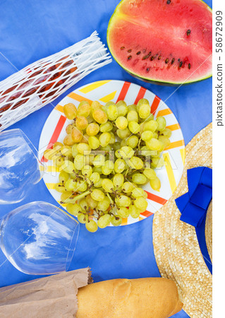 bright summer picnic. hat, glasses, grapes, 58672909