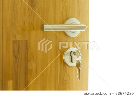 Modern style door handle on wooden door 58674280