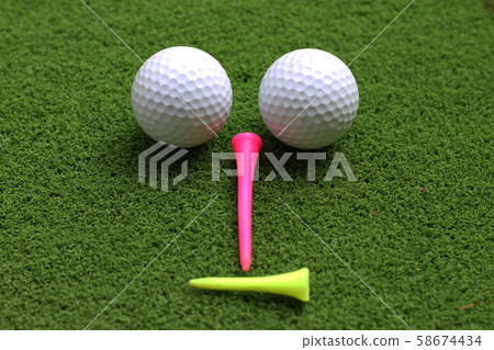 Golf equipment in beautiful golf course at sunset Golf equipment in beautiful golf course at sunset 58674434