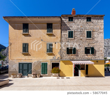 Old street in Omis city on a sunny day. 58677045