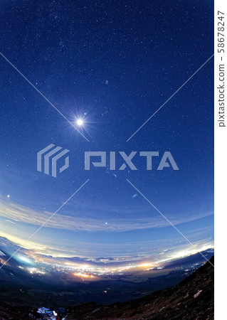 Night view and starry sky and moon seen from the summit of Mt. Fuji Night view and starry sky and moon seen from the summit of Mt. Fuji 58678247