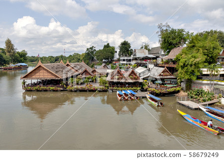 Thailand's Kwai River and the iron bridge over it 58679249