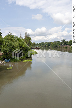 Thailand's Kwai River and the iron bridge over it 58679255