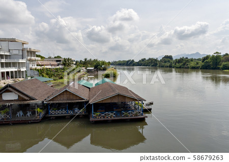 Thailand's Kwai River and the iron bridge over it Thailand's Kwai River and the iron bridge over it 58679263