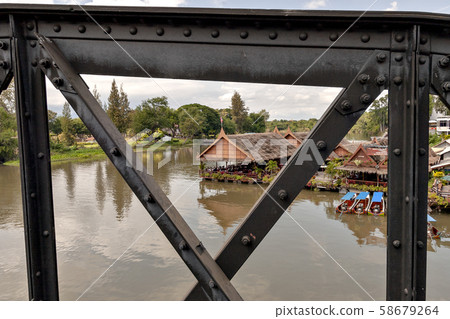 Thailand's Kwai River and the iron bridge over it Thailand's Kwai River and the iron bridge over it 58679264