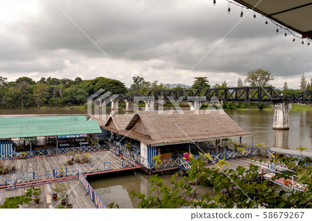 Thailand's Kwai River and the iron bridge over it 58679267