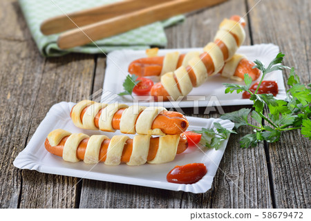 vienna sausages, pastry, baked 58679472