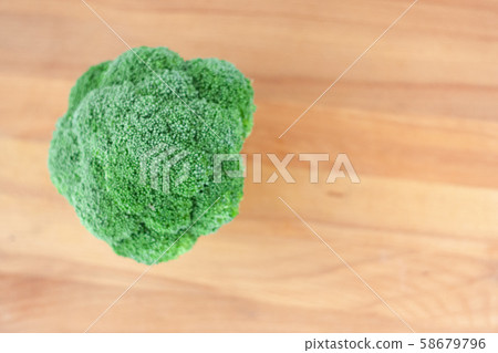 Broccoli on cut board Broccoli on cut board 58679796