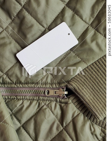 Khaki fall jacket and clothing label Khaki fall jacket and clothing label 58683045