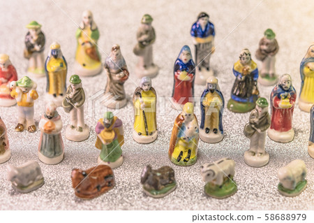 Merry Christmas golden letters on the background of Epiphany Holidays Galette de Roy Provence Sandton doll 58688979