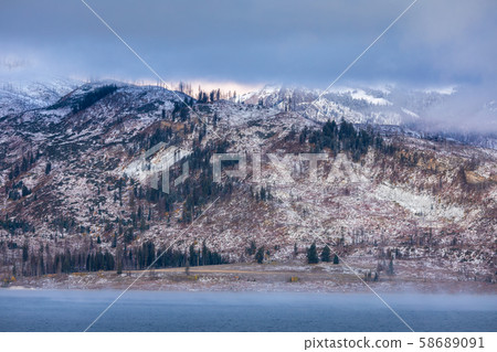 Mountain covered by snow and cloud in Grand Teton 58689091