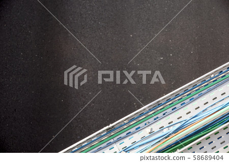 electric metal channel .electric cables inside the cable duct in an industrial building electric metal channel .electric cables inside the cable duct in an industrial building 58689404