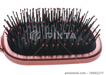 hairbrush on white close up 58692273