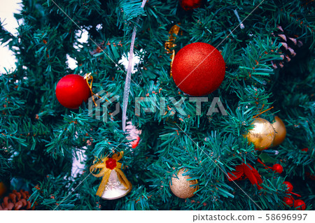 Decorating Christmas tree close up. 58696997