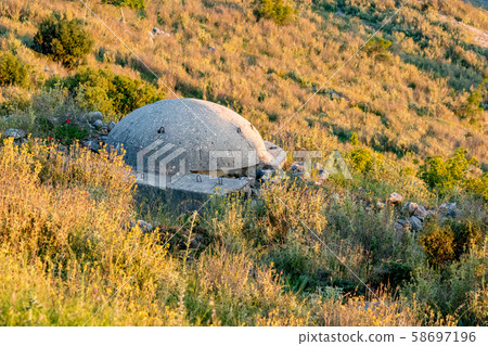 Albanian bunker near Sarande, Albania Albanian bunker near Sarande, Albania 58697196
