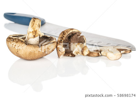 Fresh brown mushroom isolated on white Fresh brown mushroom isolated on white 58698174