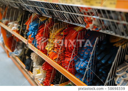 Hardware store assortment, shelf with gloves 58698339