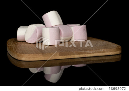 Sweet pastel marshmallow isolated on black glass 58698972