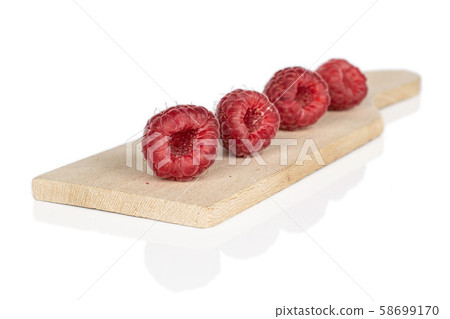 Fresh red raspberry isolated on white 58699170