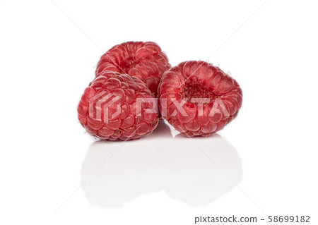 Fresh red raspberry isolated on white Fresh red raspberry isolated on white 58699182